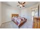 Cozy bedroom featuring a comfortable bed and ample closet space at 3449 N Canoe Creek Rd, Kenansville, FL 34739
