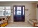 Bright and spacious entryway with a view into the living area at 3449 N Canoe Creek Rd, Kenansville, FL 34739