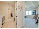 Hallway with laundry room and access to bedroom and walk-in closet at 3449 N Canoe Creek Rd, Kenansville, FL 34739