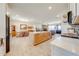 Spacious kitchen with an island and views into the dining area and living room at 3449 N Canoe Creek Rd, Kenansville, FL 34739