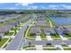 An aerial view of the neighborhood and a lake make this a great place to call home at 401 Chayne Pl, St Cloud, FL 34771