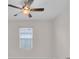 This bedroom has a ceiling fan and a window that allows natural light to illuminate the room at 401 Chayne Pl, St Cloud, FL 34771