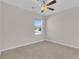 Bedroom featuring neutral walls, carpet, and a ceiling fan at 401 Chayne Pl, St Cloud, FL 34771