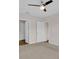 Bedroom with neutral walls, carpeted floors, and a modern ceiling fan at 401 Chayne Pl, St Cloud, FL 34771