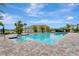 Relaxing community pool with plenty of lounge chairs at 401 Chayne Pl, St Cloud, FL 34771