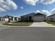 Lovely single-story home featuring a manicured lawn, classic design, and ample parking space at 401 Chayne Pl, St Cloud, FL 34771