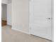 Neutral walls and white doors provide a clean aesthetic in the hallway at 401 Chayne Pl, St Cloud, FL 34771