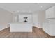 Modern kitchen featuring white cabinets, a large island, stainless steel appliances, and contemporary recessed lighting at 401 Chayne Pl, St Cloud, FL 34771