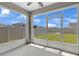 A screened-in patio offers an enjoyable view of the yard at 401 Chayne Pl, St Cloud, FL 34771