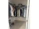 Walk-in closet with wire shelving and clothing rods, providing ample storage space at 4033 Sunrise Ridge Blvd, Groveland, FL 34736