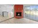 Open concept living room featuring a fireplace, bright and spacious at 45 S Edgemon Ave, Winter Springs, FL 32708