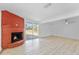 Open concept living room featuring a fireplace, bright and spacious at 45 S Edgemon Ave, Winter Springs, FL 32708