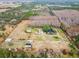 Aerial view showing property boundaries and structures on a large lot at 4771 Deen Still Rd, Polk City, FL 33868