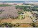 Aerial view showing property, buildings and pond at 4771 Deen Still Rd, Polk City, FL 33868
