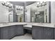 Large bathroom with double sinks and a spacious vanity at 510 Golfpark Dr, Celebration, FL 34747