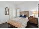 Comfortable bedroom with a double bed and wood floors at 510 Golfpark Dr, Celebration, FL 34747