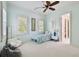 Charming bedroom with window seating and ensuite bath at 510 Golfpark Dr, Celebration, FL 34747