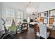Spacious bedroom with dark wood floors and large windows at 510 Golfpark Dr, Celebration, FL 34747