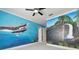 bedroom with ocean and waterfall murals at 510 Golfpark Dr, Celebration, FL 34747