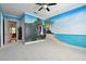 Bedroom with tropical beach mural and carpet at 510 Golfpark Dr, Celebration, FL 34747