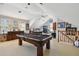 Game room with pool table, media console, and framed sports memorabilia at 510 Golfpark Dr, Celebration, FL 34747