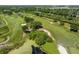 Aerial view of a lush green golf course at 510 Golfpark Dr, Celebration, FL 34747