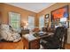 Home office with a large desk and comfortable chair at 510 Golfpark Dr, Celebration, FL 34747