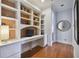 Home office features built-in shelving and a large desk at 510 Golfpark Dr, Celebration, FL 34747