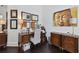 Serene home office with wood desk and calming decor at 510 Golfpark Dr, Celebration, FL 34747
