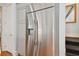Stainless steel refrigerator with an ice and water dispenser at 510 Golfpark Dr, Celebration, FL 34747