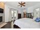 Main bedroom with sitting area and private access to patio at 510 Golfpark Dr, Celebration, FL 34747
