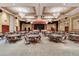 The ballroom is bathed in light and provides plenty of space for guests and events at 663 Shorehaven Dr, Poinciana, FL 34759