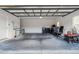 Spacious two-car garage with ample room for storage and organizing household items at 663 Shorehaven Dr, Poinciana, FL 34759