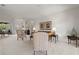 Spacious living room with neutral carpet, white walls, comfortable seating, and ample natural light at 663 Shorehaven Dr, Poinciana, FL 34759