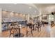 A cozy restaurant with a brick accent wall and a variety of seating options for a relaxed dining experience at 663 Shorehaven Dr, Poinciana, FL 34759