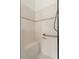 Shower with built-in bench and grab bar for safety at 663 Shorehaven Dr, Poinciana, FL 34759