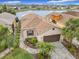 Attractive single-story home with lake view and paver driveway at 669 Grand Canal Dr, Kissimmee, FL 34759