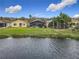 Enclosed patio overlooking a lake, great for outdoor entertaining at 669 Grand Canal Dr, Kissimmee, FL 34759