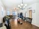 Spacious dining area with hardwood floors and a chandelier at 669 Grand Canal Dr, Kissimmee, FL 34759