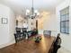 Open concept dining room, adjacent to kitchen and living areas at 669 Grand Canal Dr, Kissimmee, FL 34759