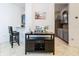 Kitchen with dark wood island and gray cabinets at 669 Grand Canal Dr, Kissimmee, FL 34759