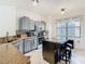 Modern kitchen with stainless steel appliances and granite countertops at 669 Grand Canal Dr, Kissimmee, FL 34759
