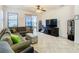 Comfortable living room with sectional sofa and large TV at 669 Grand Canal Dr, Kissimmee, FL 34759