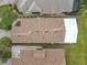 Aerial view of house roof and carport at 669 Grand Canal Dr, Kissimmee, FL 34759