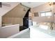 Charming bathroom features a modern shower, marble-top double vanity, and stylish fixtures at 723 New York Ave, St Cloud, FL 34769
