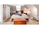 Inviting bedroom with a cozy bed, a trunk at the foot, and side tables offering a comfortable retreat at 723 New York Ave, St Cloud, FL 34769