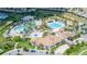 Resort-style pool and clubhouse with spacious sundeck and lush landscaping at 771 Drop Shot Dr, Davenport, FL 33896