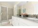 Bathroom with double vanity and shower at 771 Drop Shot Dr, Davenport, FL 33896