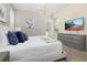Spacious bedroom with king-size bed and modern decor at 771 Drop Shot Dr, Davenport, FL 33896