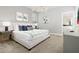 Spacious main bedroom with plush bedding and stylish decor at 771 Drop Shot Dr, Davenport, FL 33896